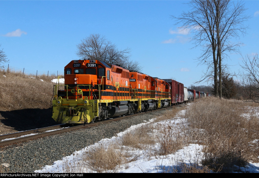 3391 sits tied down with the 3406 & 3408 after completing Z151's interchange work with CSX